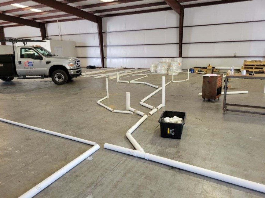 Plumbing systems laid out in the Custom Services warehouse