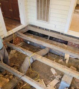 Porch joists exposed during restoration